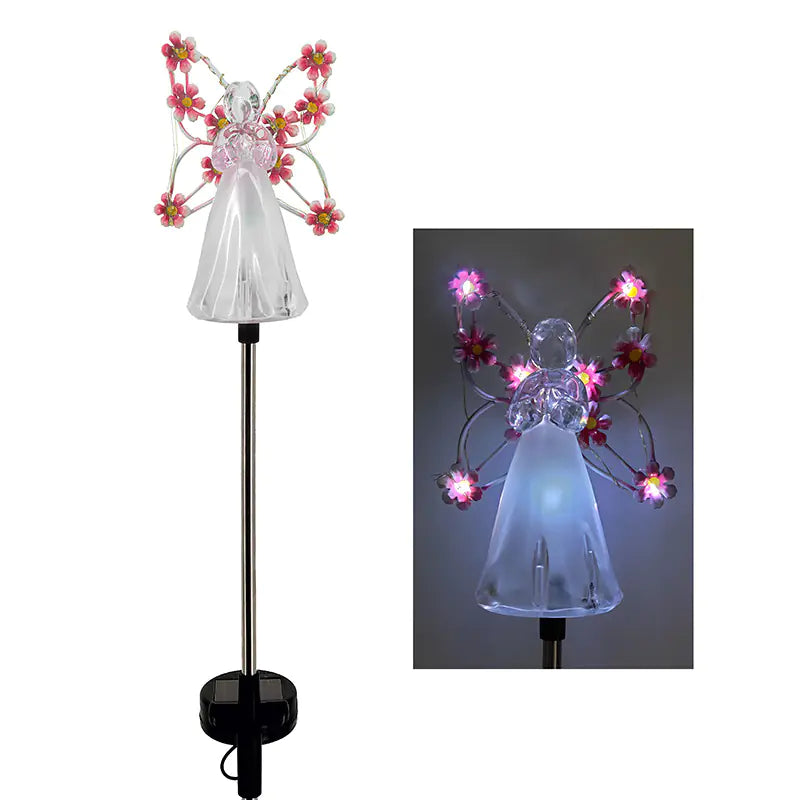 Clear angel on garden stake with pink flower lights on its wings, when light the flowers glow pink and white