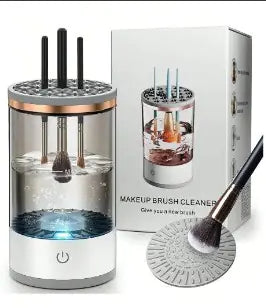 Cylindrical wireless makeup brush cleaner with clear tank, shows water swirling around three makeup brushes suspended from the lid