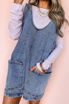 U Neck Patched Pocket Denim Overall shorts. Big front pockets on the thighs and faded blue with double stitched hem and trimming. 