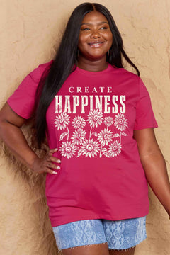 Pink Tshirt with round neck and short sleeves, the caption in capital letters says CREATE HAPPINESS, with create being in small letters centered over Happiness. underneath the letters, in white as well, ten flowers arranged in three rows.