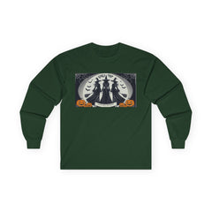 Forest Green Tee shirt with a Halloween-themed graphic,witches standing with brooms facing the full moon slogan says Lets get Wicked at the bottom and Girls Trip at top