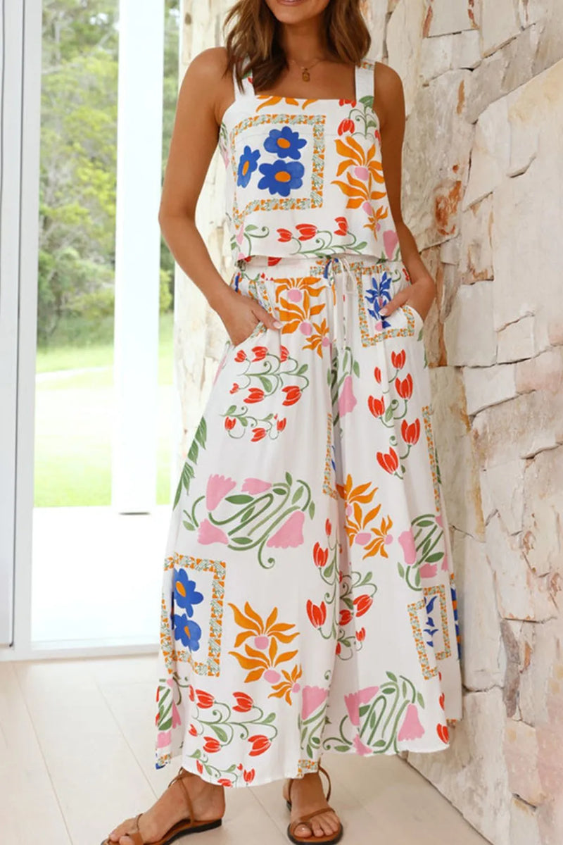 Printed Square Neck Top and Wide legged Pants Set. Very full could mistake for a skirt. Front pockets. White with blocks of different flower patterns and colors
