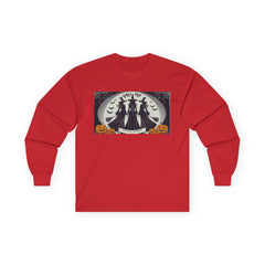 Red Tee shirt with a Halloween-themed graphic,witches standing with brooms facing the full moon slogan says Lets get Wicked at the bottom and Girls Trip at top