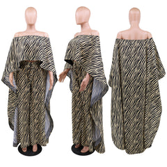 Zebra print off-shoulder two piece african style suit on mannequins with a white background
