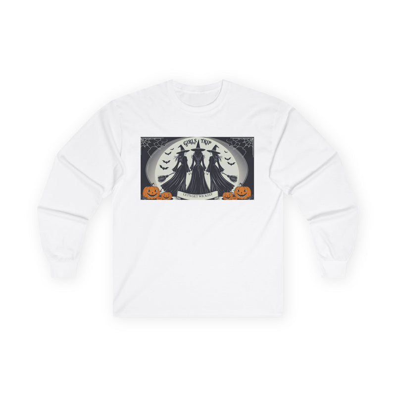 White sweatshirt with a Halloween-themed graphic,witches standing with brooms facing the full moon slogan says Lets get Wicked at the bottom and Girls Trip at top