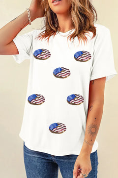 White tshirt with oval American flag designs across the front. Round neck, short sleeves.