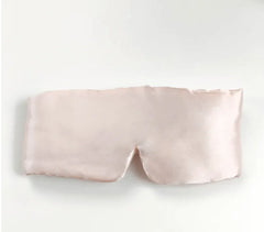 Silky sleep mask on a white background