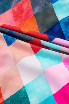 Colorful bathinsuit with geometric pattern and fabric texture close-up