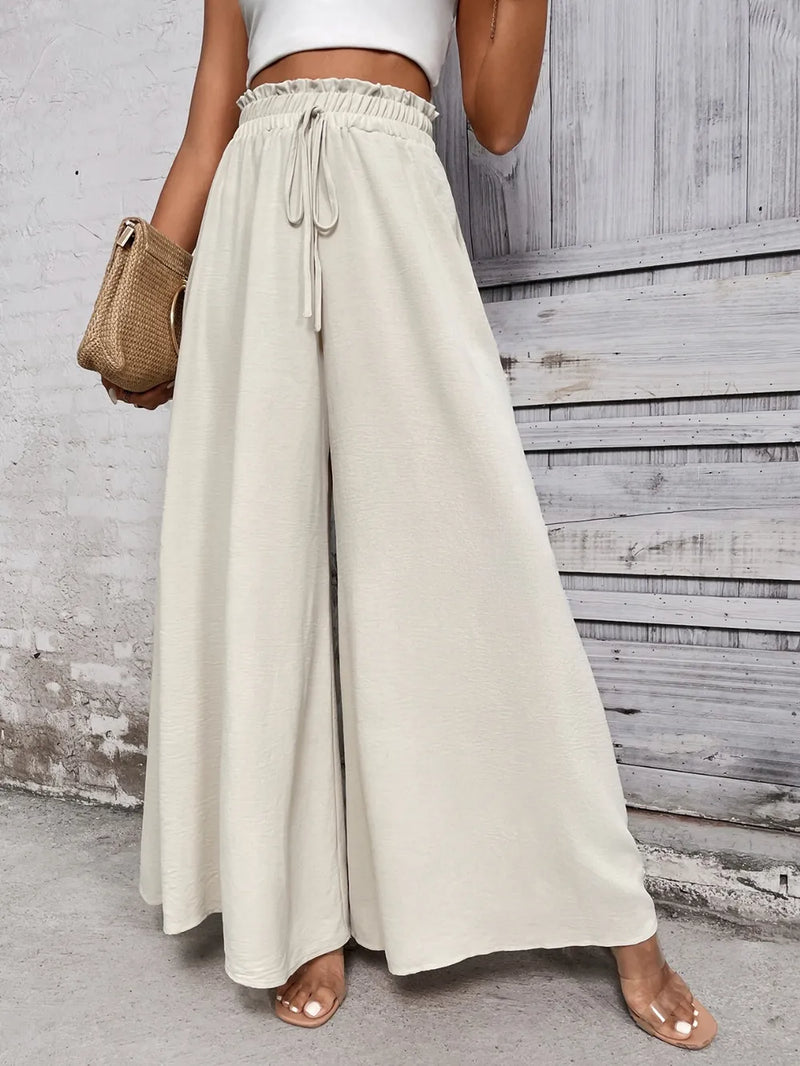 Honey Tied High Waist Wide Leg Pants. Elastic waist with frill, drawstring tied and super wide legs look like a long skirt