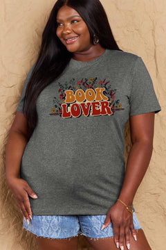 A grey t-shirt with 'Book Lover' printed in front of s mass of small flowers and stems