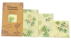 Set of beeswax food wraps with a brown cardboard packaging featuring illustrations.