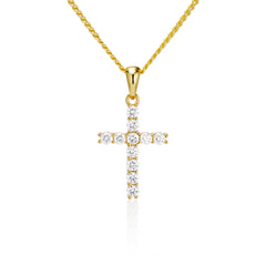 Gold vermeil cross pendant necklace with moissanite stones on a white background