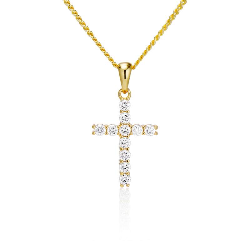Gold vermeil cross pendant necklace with moissanite stones on a white background
