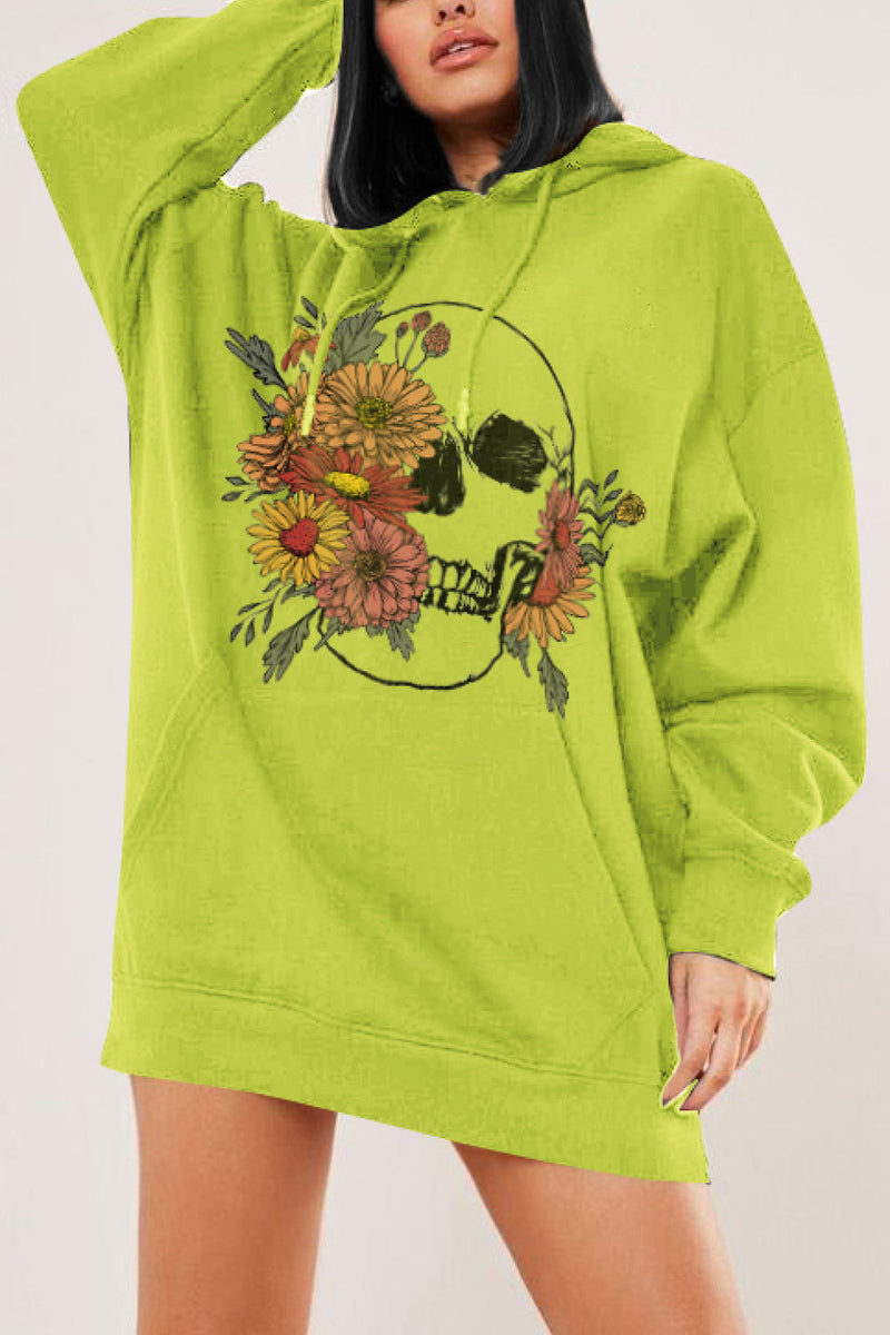 Bright lime green pull over hoodie with a skull outlined in black  and flowers on each side of the skull, the biggest bunch covering the right eye and part of the mouth. Large hand warmer pocket in front, long sleeves, and bottom that comes down almost to mid thigh
