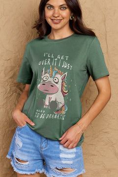 Green Tshirt with round neck and short sleeves, Sad unicorn with big eyes sitting down with slogan  I'LL GET OVER IT I JUST NEED TO BE DRAMATIC