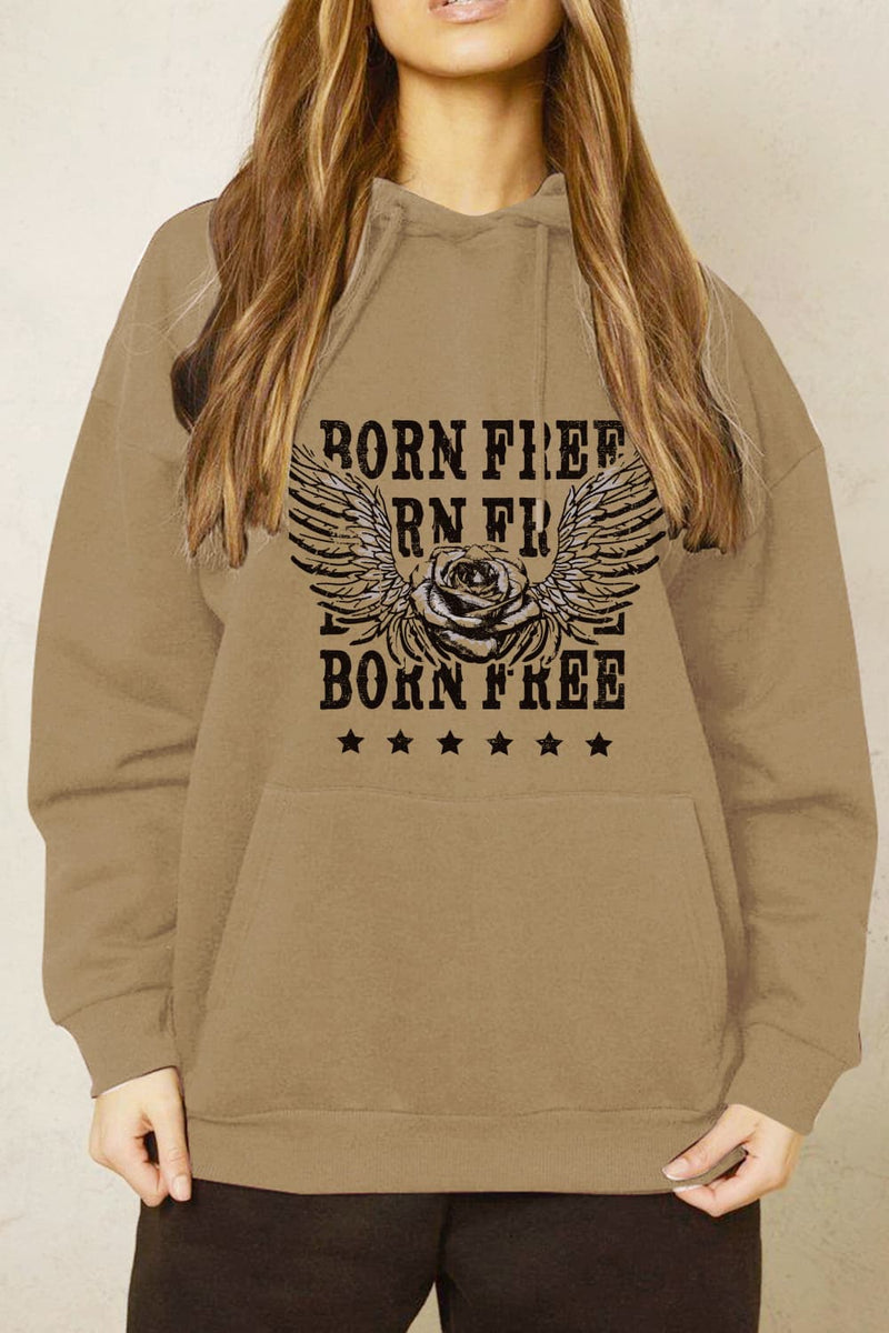 light brown or beige hoodie with hand warmer pocket on front. Born Free slogan printed several times, overlaid with a Rose and Eagle Wings and stars underneath.