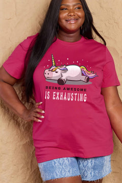 Dark Pink Tshirt with a unicorn laying on it's belly with all legs splayed out and the slogan BEING AWESOME IS EXHAUSTING under it. Round neck and short sleeves