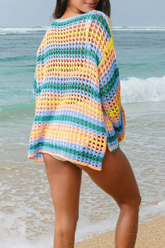 Back view of Colorful crochet cover-up with horizontal stripes on open work stitching, blue, green, yellow, peach. Boat neck, pullover with dropped shoulders and extra long sleeves