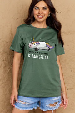 Green Tshirt with a unicorn laying on it's belly with all legs splayed out and the slogan BEING AWESOME IS EXHAUSTING under it. Round neck and short sleeves