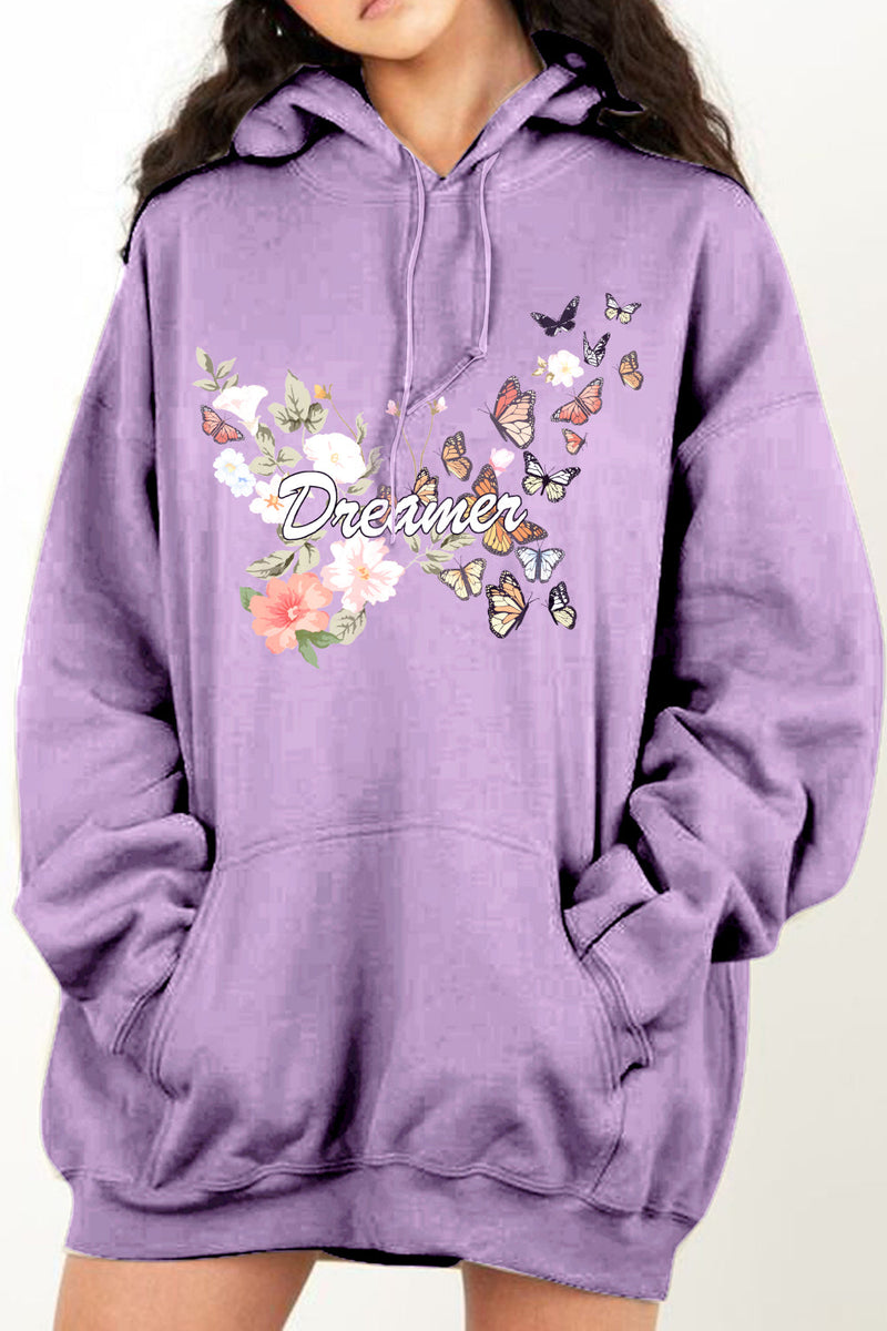 Purple hoodie with floral and butterfly design with Dreamer in Cursive white letters across the front. Dropped shoulder pull over with hand warmer pocket