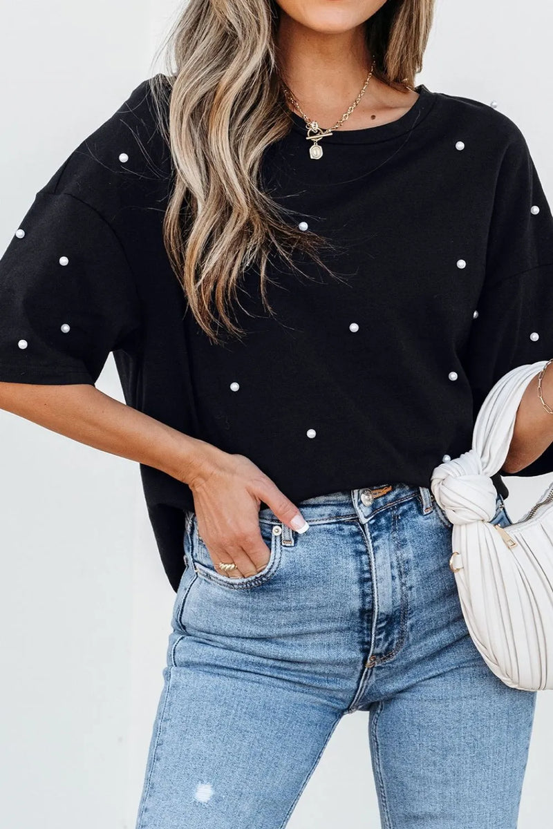Pearl beaded loose fit tshirt that looks from a distance like it is polkadotted. round neck, short sleeves