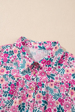 Floral patterned shirt with pink and green colors on a beige background