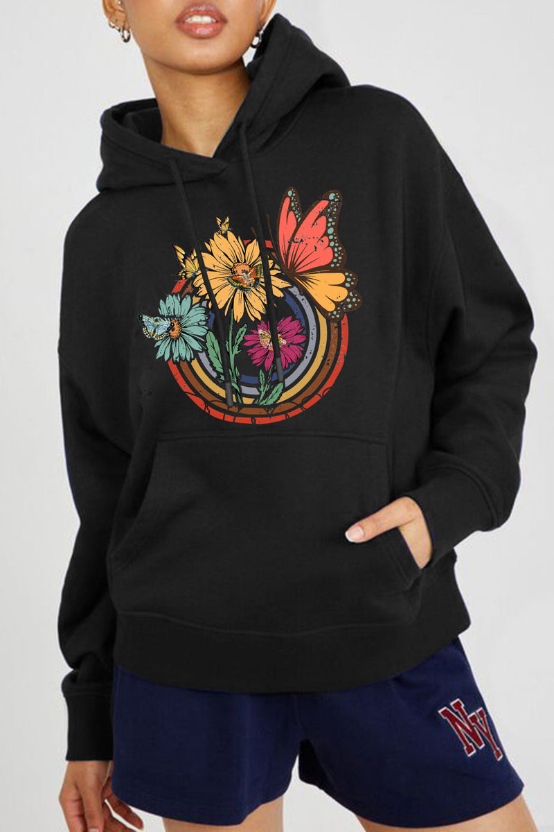 Black hoodie with colorful floral design that has 5 colored rings inside each oher with three large flowers and a butterfly in front of them.