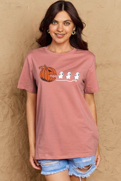 Pink Tshirt with Jackolantern appearing to be trying to eat a line of fleeing ghosts
