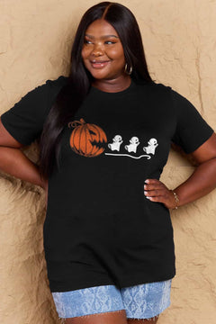 Black Tshirt with Jackolantern appearing to be trying to eat a line of fleeing ghosts