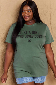 A green t-shirt with 'Just a Girl Who Loves Dogs' text and a pawprint below in white. Round neck and short sleeves, loose fit