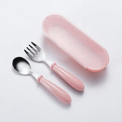 Pink children's cutlery set with a case on a light gray background