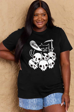 Black tshirt round neck with short sleeves and Halloween design of 6 white skulls below and outline of a cat saying boo and holding a scythe.