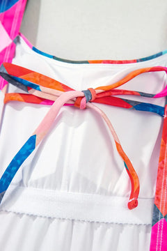 Close up of Colorful striped spaghetti strap on back of one piece bathing suit