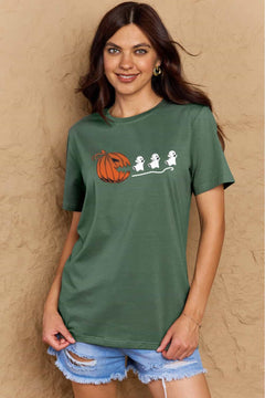 Green Tshirt with Jackolantern appearing to be trying to eat a line of fleeing ghosts