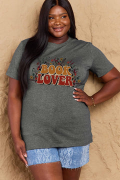 A grey t-shirt with 'Book Lover' printed in front of s mass of small flowers and stems