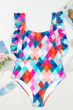 Colorful geometric patterned swimsuit on a white background
