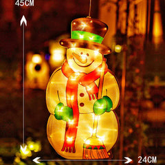 Decorative snowman lighted ornament with measurements on a blurred outdoor background