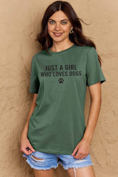 A green t-shirt with 'Just a Girl Who Loves Dogs' text and a pawprint below in white. Round neck and short sleeves, loose fit