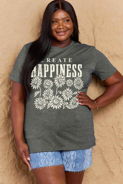 Grey Tshirt with round neck and short sleeves, the caption in capital letters says CREATE HAPPINESS, with create being in small letters centered over Happiness. underneath the letters, in white as well, ten flowers arranged in three rows.