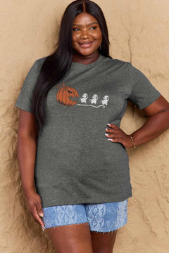 Grey Tshirt with Jackolantern appearing to be trying to eat a line of fleeing ghosts
