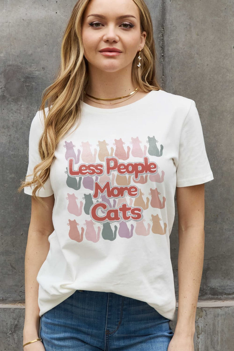 White t-shirt with four rows of pastel cats and Less People More Cats printed over them