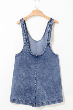 U Neck Patched Pocket Denim Overall shorts. Big front pockets on the thighs and faded blue with double stitched hem and trimming. 