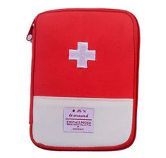 Red first aid pouch with a white cross on a white background