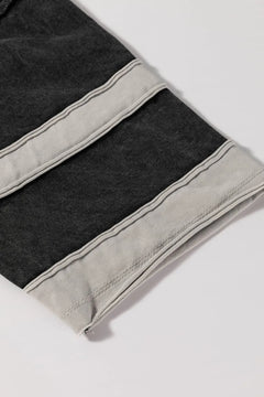 Close-up of black and gray striped fabric on a white background