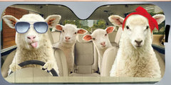 Sheep in a car with one wearing sunglasses and another with a red hat, on a gray background.
