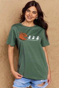 Green Tshirt with Jackolantern appearing to be trying to eat a line of fleeing ghosts