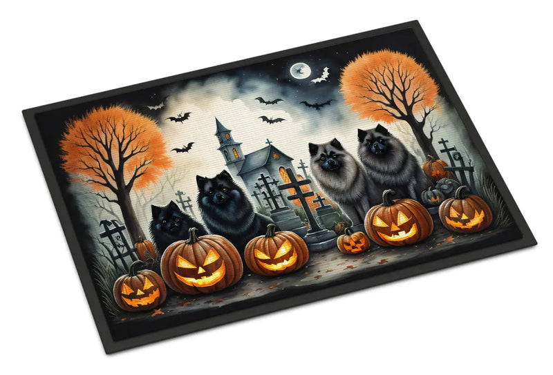 Halloween-themed doormat with Keeshonds, pumpkins, and a haunted church and cemetary design.