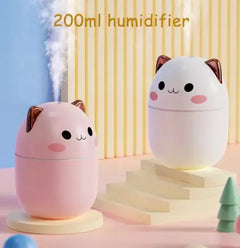 Two cute cat-shaped humidifiers on a colorful background with text indicating capacity.