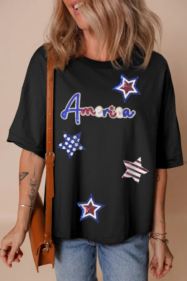 Sequined America Star Round Neck black TShirt with the letters and stars in red,white, and blue