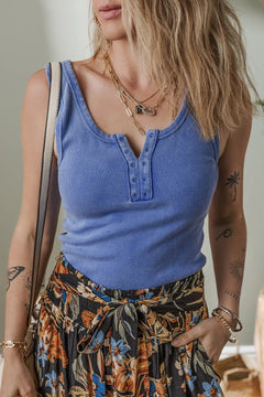 Blue ribbed look tank top with notched neck and faux button holes.